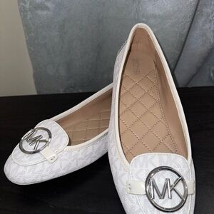 MICHAEL Michael Kors White Flats with Silver Emblem